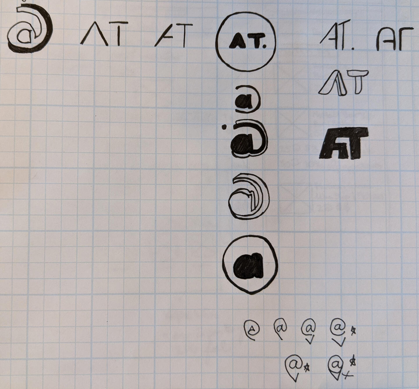 Rough sketches of @'s new logo.